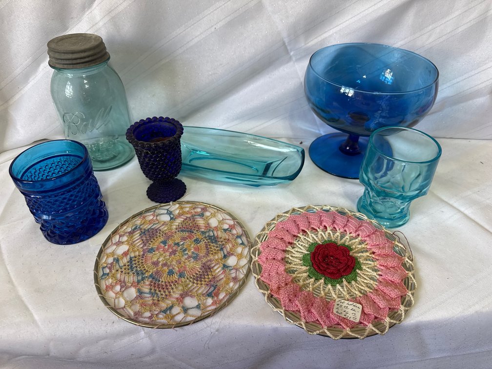 Blue Glassware and Crocheted Trivets
