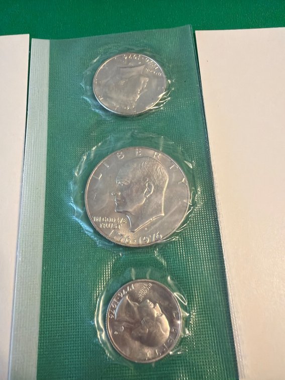 Three Uncirculated U.S. Coins in Clear Packaging