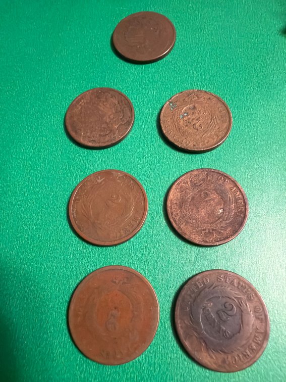 Seven US Two-Cent Coins