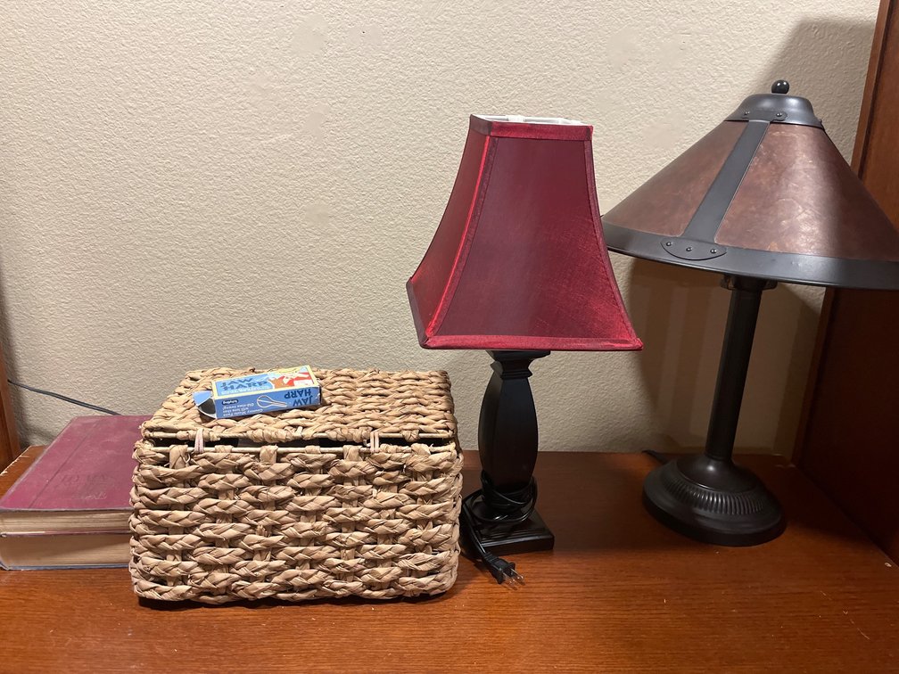 Contents of Shelves: Books, Lamps, and Basket