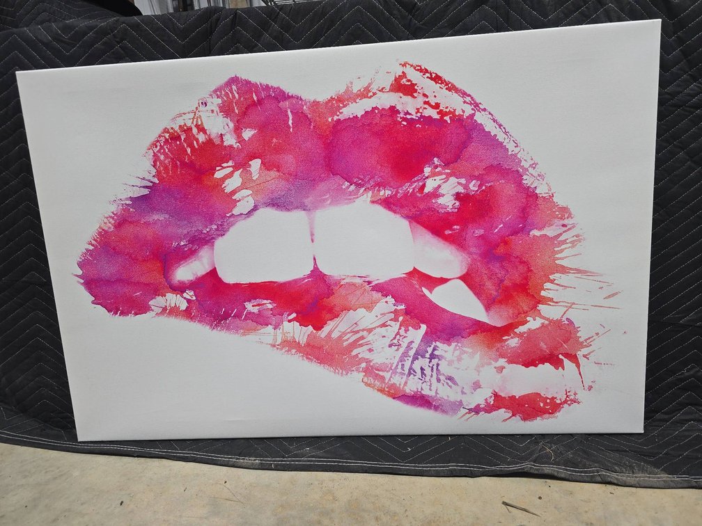 Canvas Artwork Depicting Lips in Red and Pink Tones