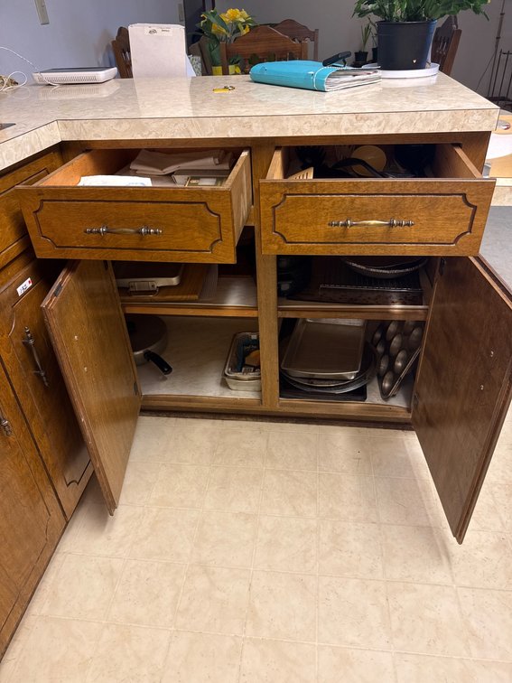 Contents of two cabinets and two drawers