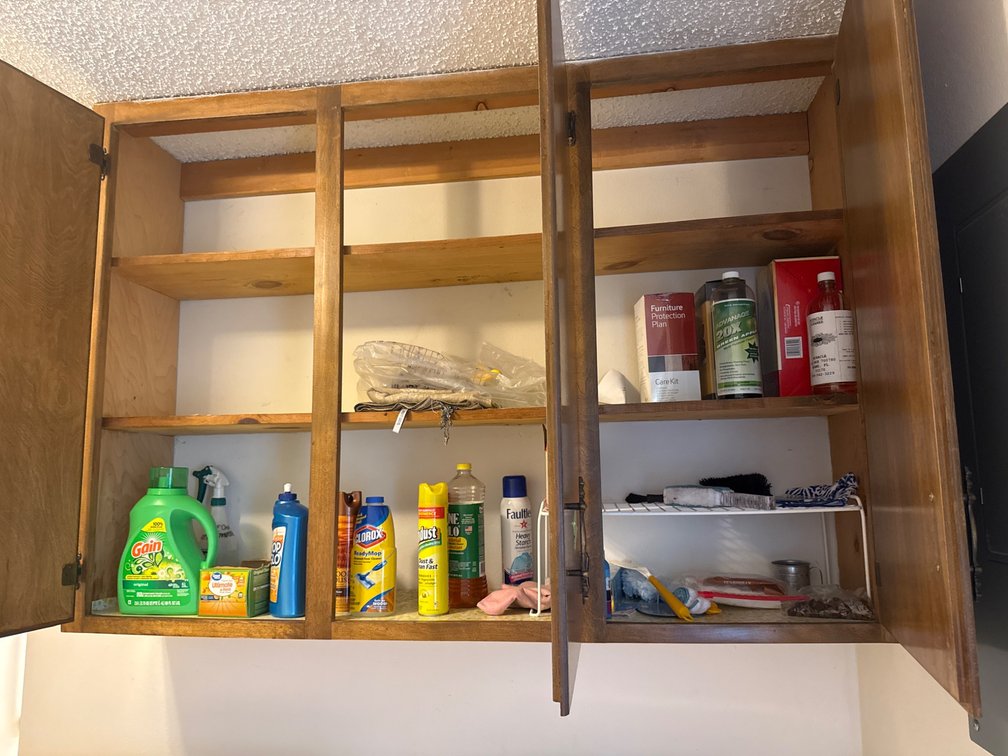 Contents of cabinets above washer and dryer 