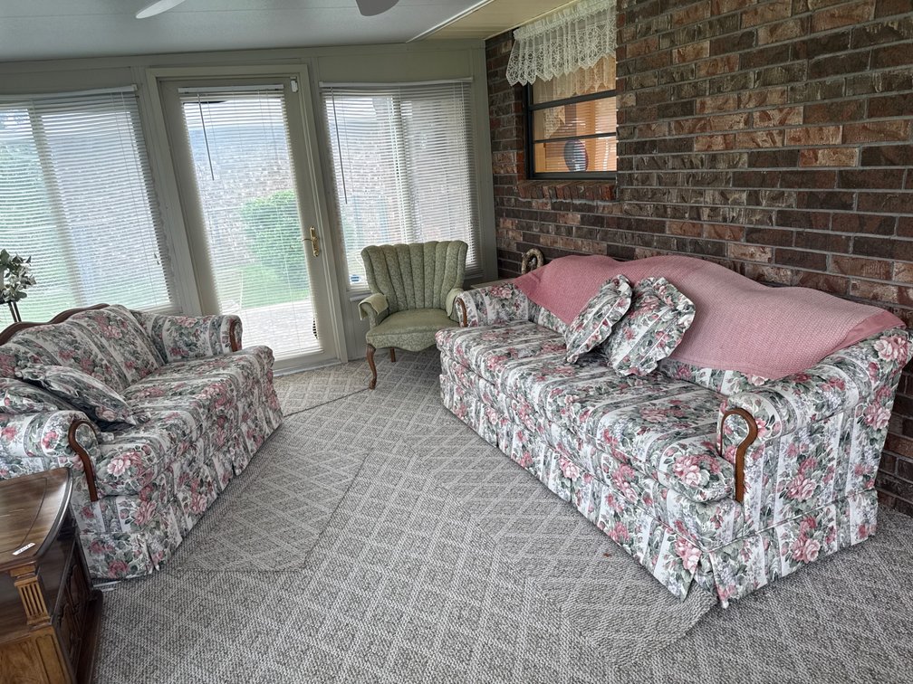 Floral Upholstered couch and loveseat Approximately 7 Feet Long and 5 feet long. 