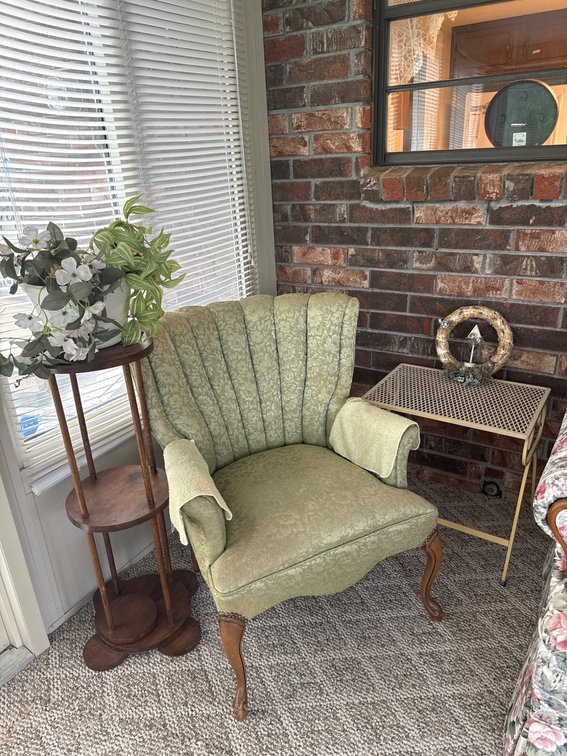 Armchair, Wooden Plant Stand, and Metal Mesh Side Table Ensemble
