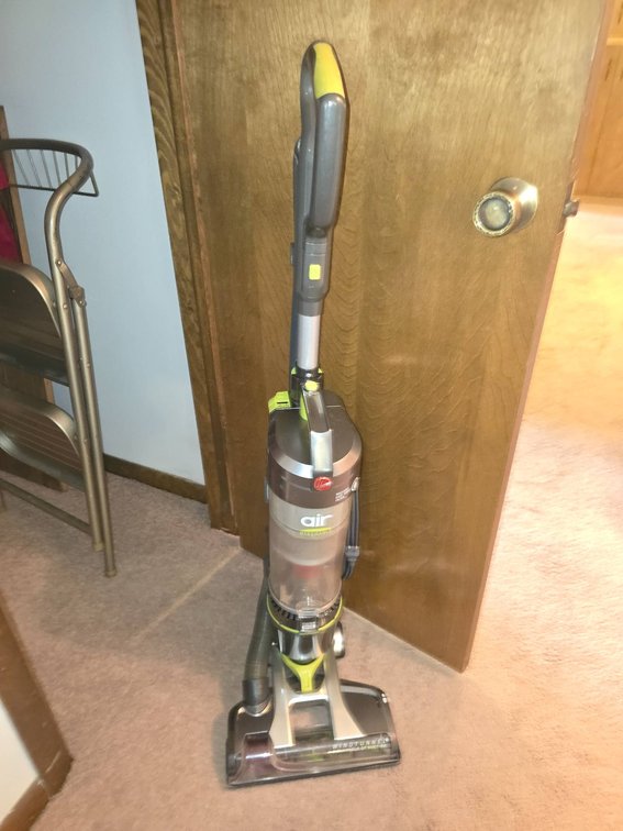 Contents of Closet and Hoover Air Upright Vacuum Cleaner