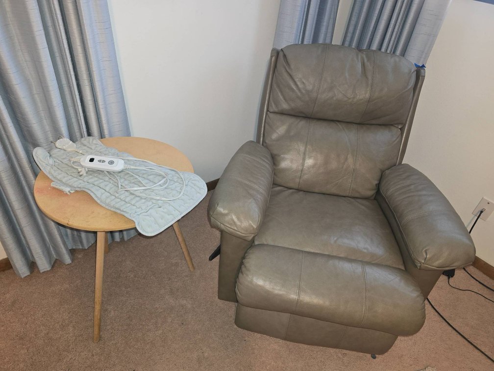Reclining Beige Chair with Side Table and Heating Pad