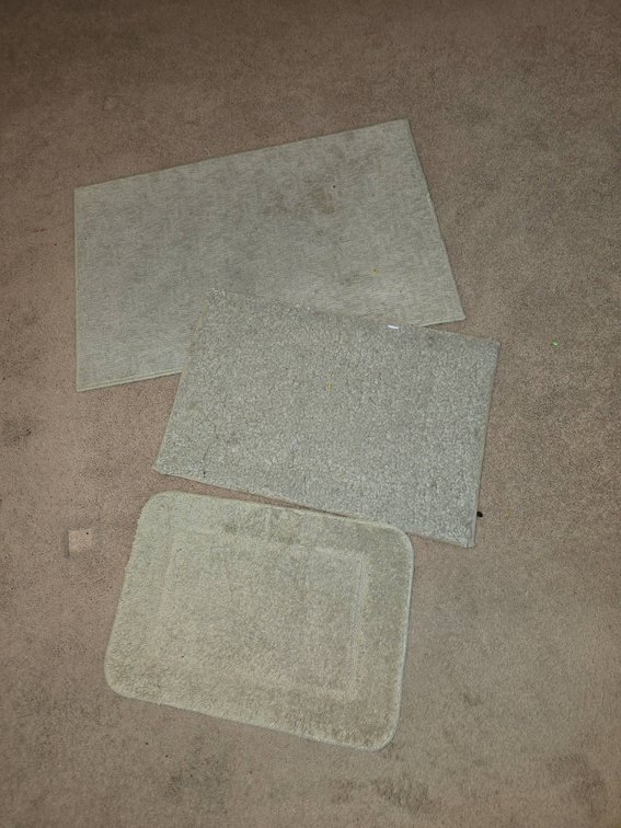Three Beige Floor Mats