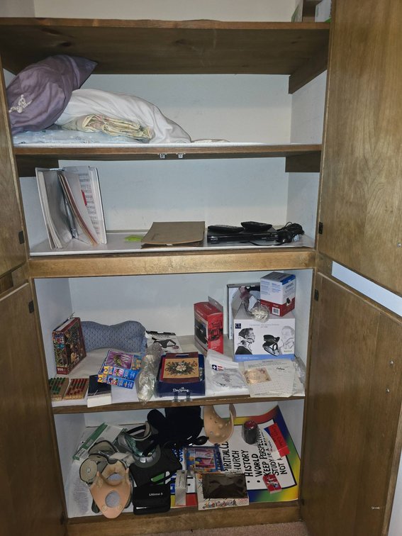 Contents of Hallway Closet With Assorted Items and Electronics