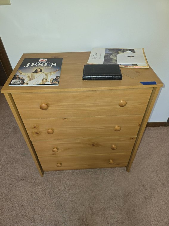 Four-Drawer Wooden Dresser with Knob Handles