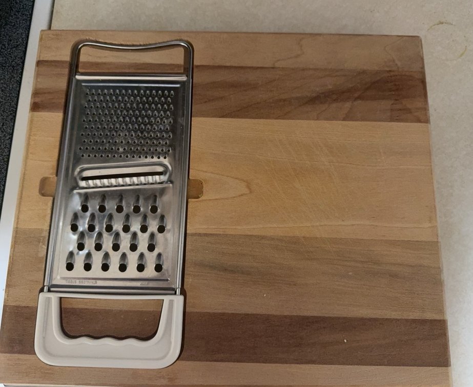 Wood Cutting Board with Multi-Surface Grater and Slide Tray