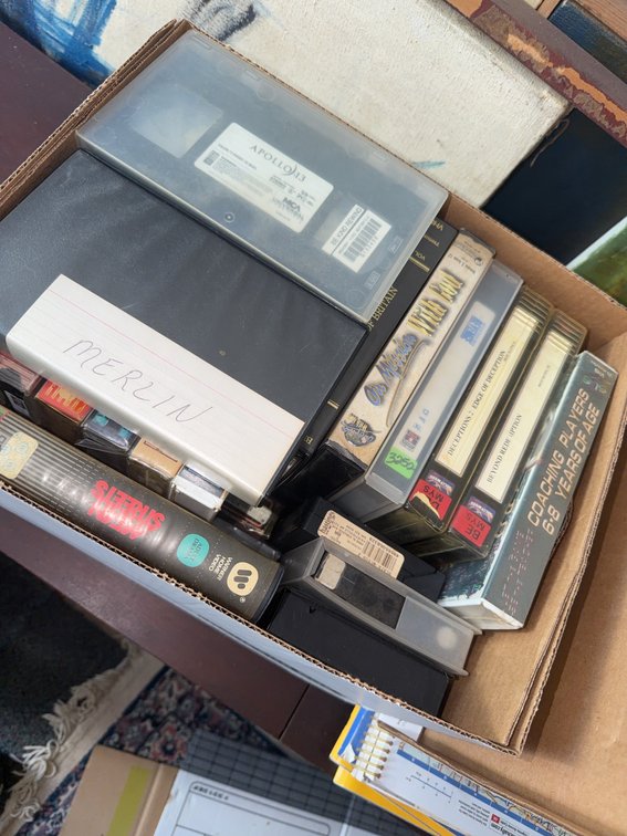 Case of Assorted VHS Tapes Including Movies, Documentaries, and TV Shows