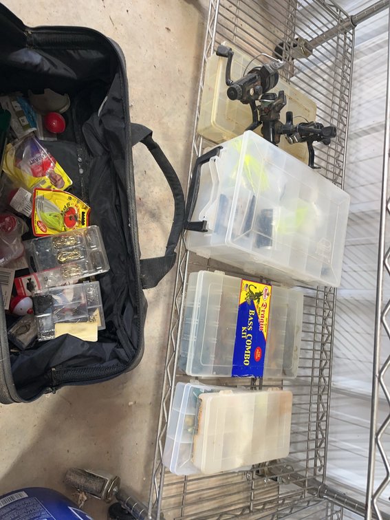 Fishing Tackle Lot with Reels, Lures, Plastic Baits, and Storage Cases