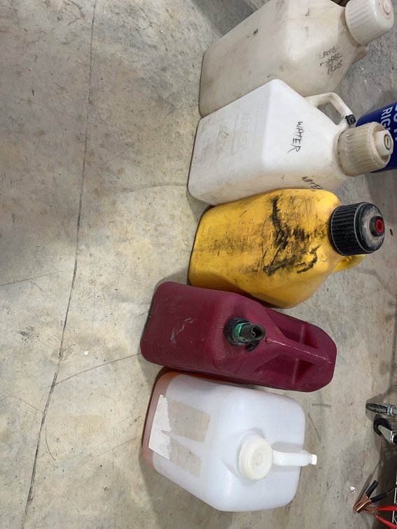 4 Plastic Utility Jugs and Safety Fuel Containers