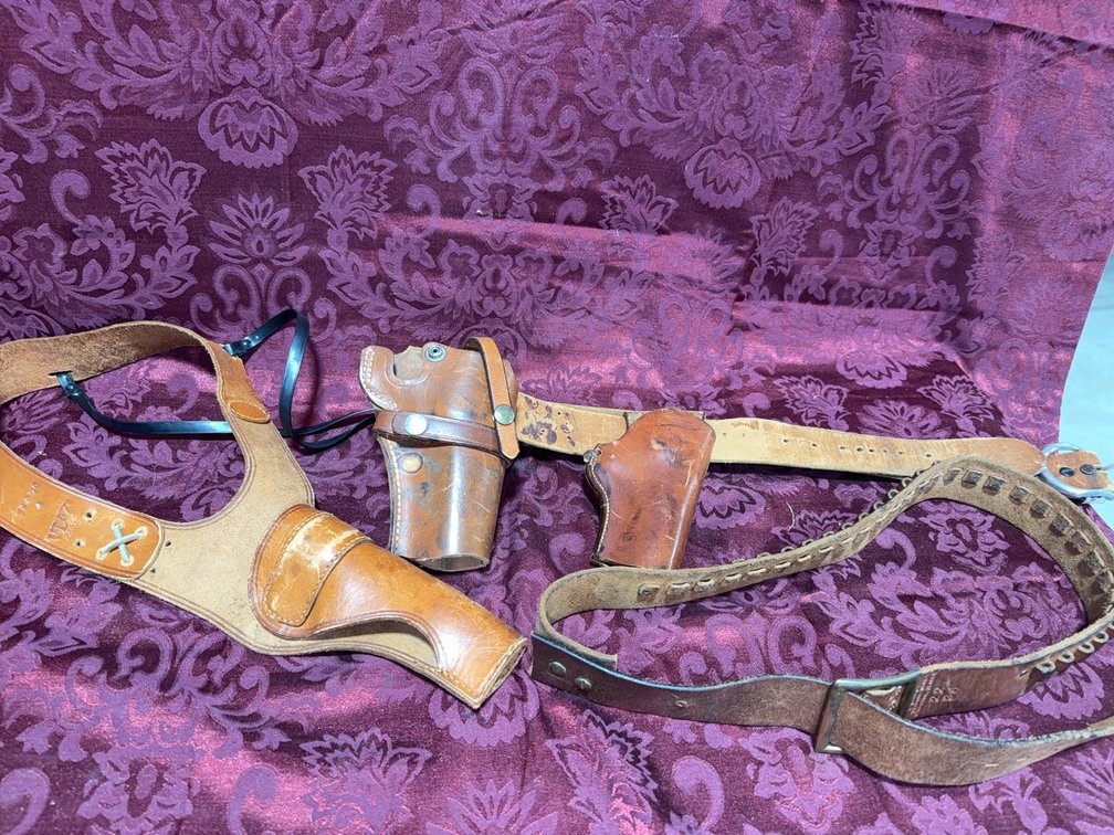 Leather Gun Holsters and Cartridge Belts by Heiser and Myres