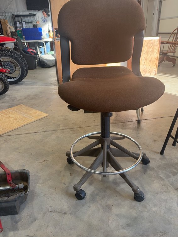 Brown Upholstered Adjustable Drafting Chair with Foot Ring and Casters
