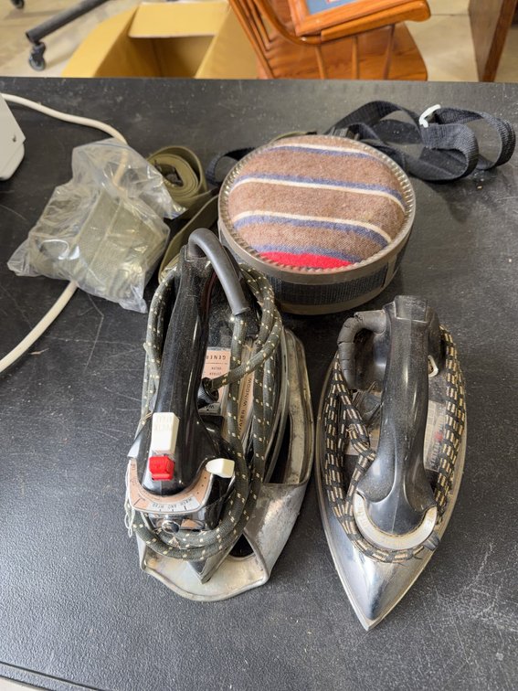 General Electric Electric Irons, Vintage Hot Water Bottle, and Military Straps Lot
