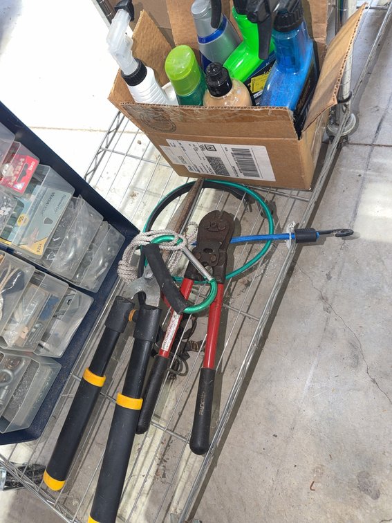 Hand Tools With Bolt Cutter, Loppers, Bike Lock, and Cleaning Supplies