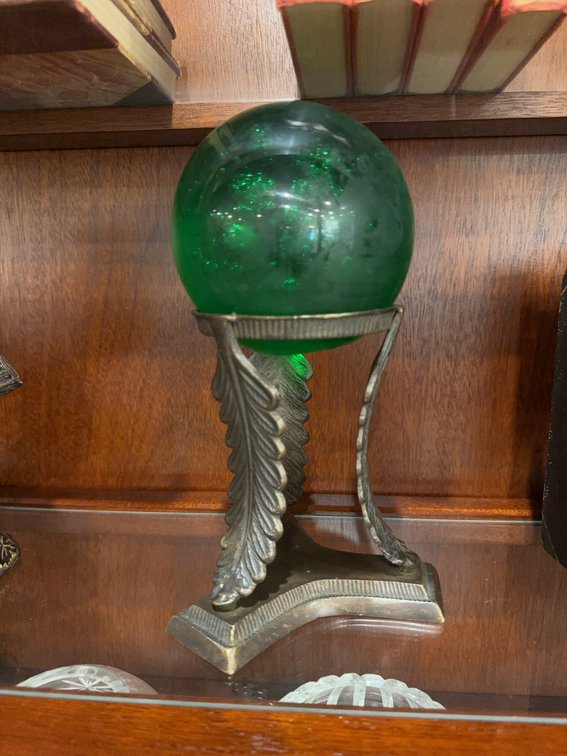 Green Glass Sphere on Ornate Metal Stand, Approximately 9 Inches Tall