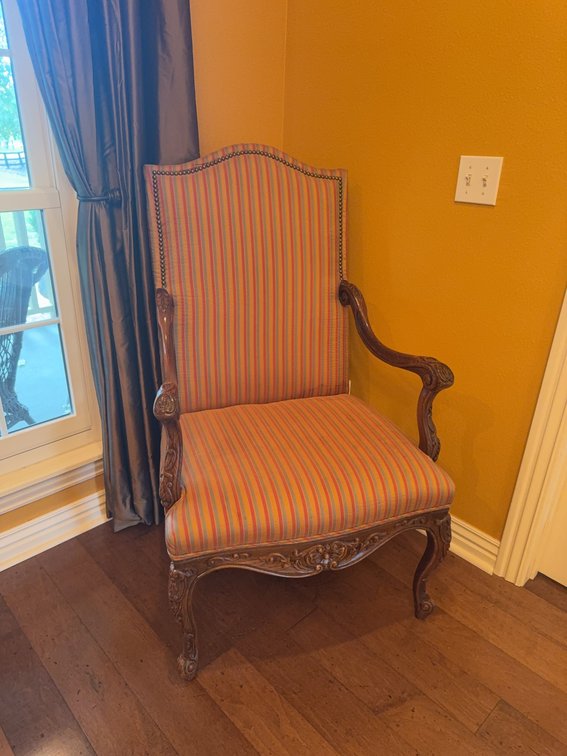 Carved Wood Armchair With Nailhead Trim and Striped Upholstery