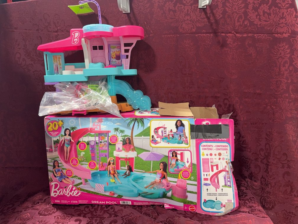 Open Box Barbie Dream Pool Playset and 2025 Holiday Barbie Doll in Box