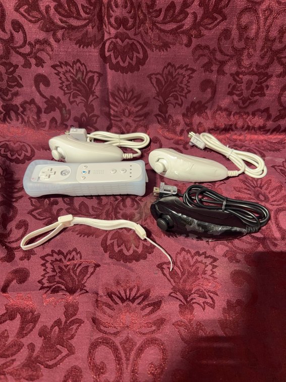 Nintendo Wii Remote and 3 Nunchuks White and Black Accessories Bundle
