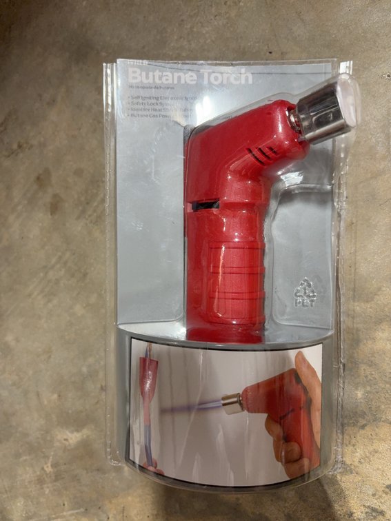 Red Handheld Butane Torch in Original Packaging