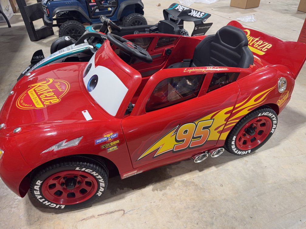 Huffy Disney Cars Lightning McQueen 6V Battery Ride-On Car with Charger and Manual