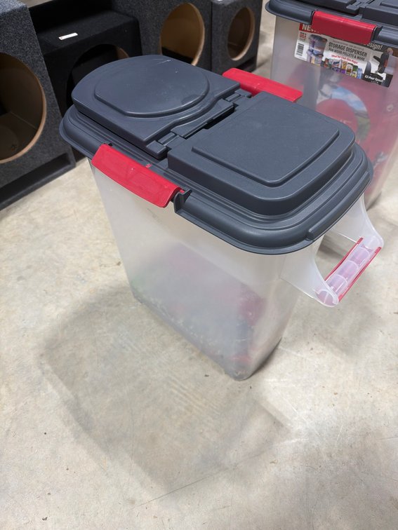 Plastic Pet Food Storage Container With Sealed Lid and Bag of Cardinal Blend Bird Seed