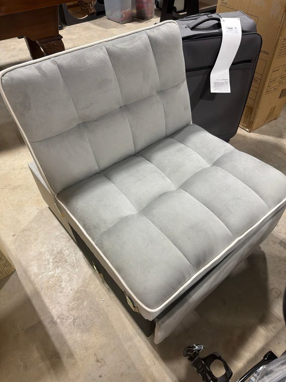 Modern Gray Convertible Chair With White Piping and Storage Base