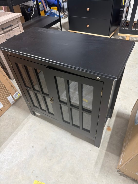 Black Wooden Cabinet With Glass Paneled Doors And Shelf