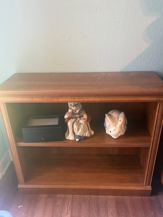 Wooden Shelf With Decorative Contents