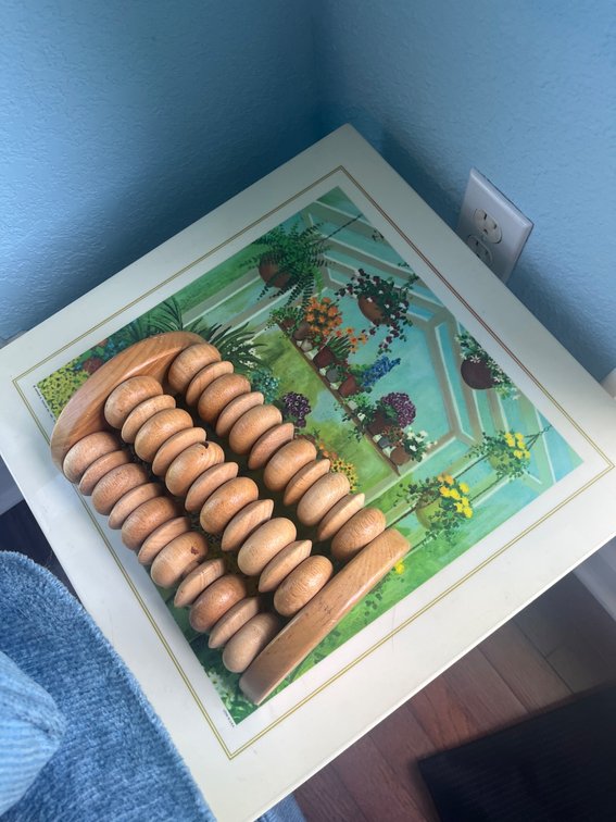 Wooden Roller Massager and Painted Square Table