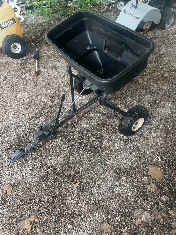 Tow-Behind Lawn Spreader With Plastic Hopper and Steel Frame