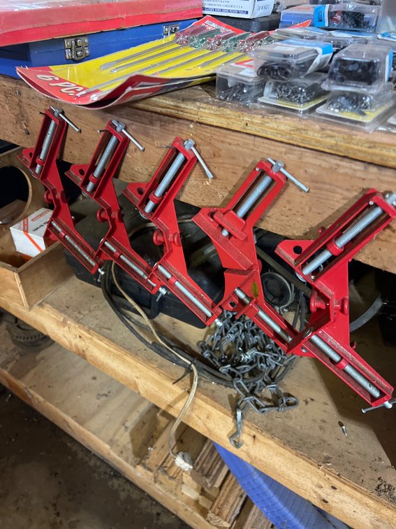 Four Red Corner Clamps