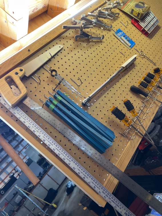 Pegboard With Assorted Tools and Accessories