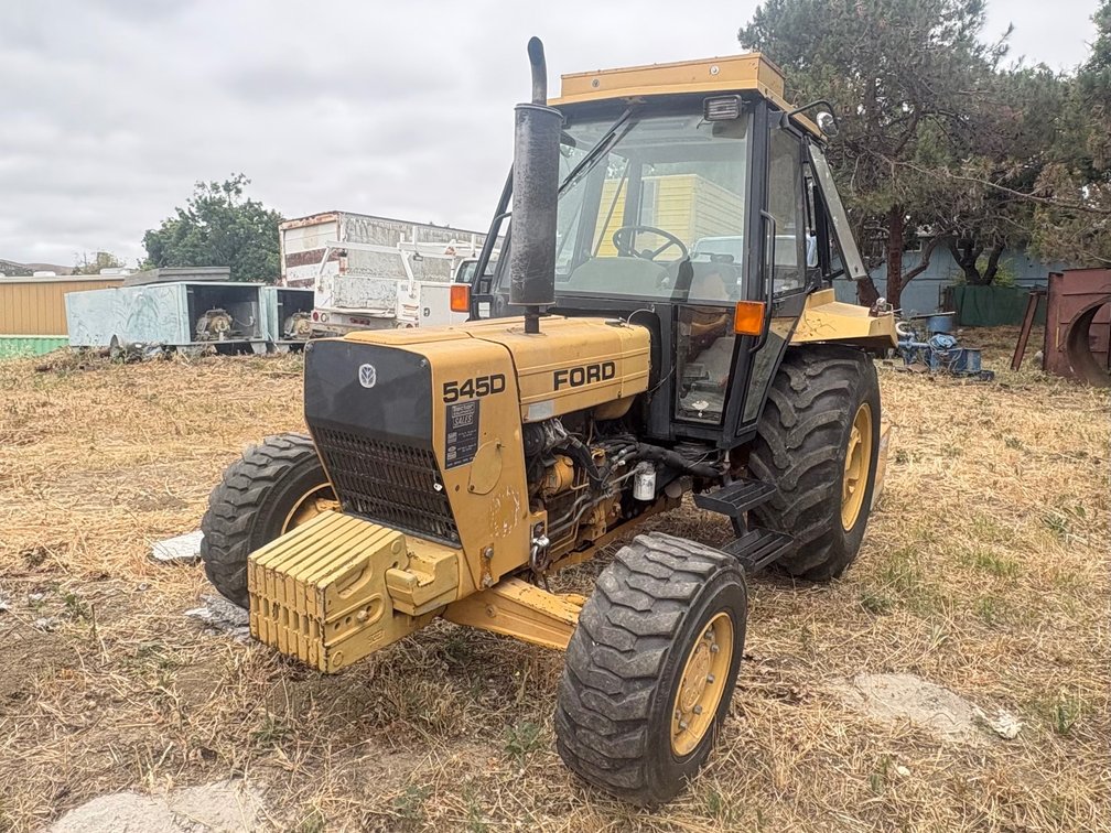 Ford 545D with Woods Side Boom Mower