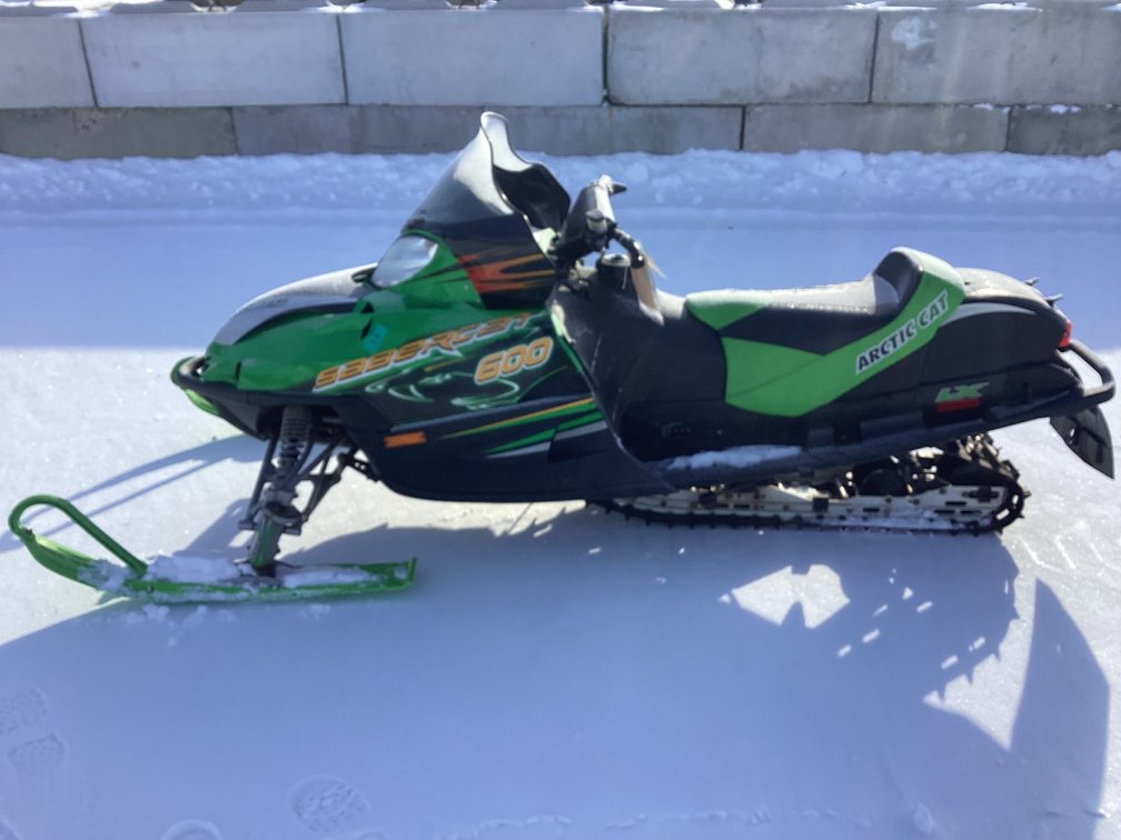 2004 Arctic Cat Sabercat 600, started, shows 4,179 miles, registration.