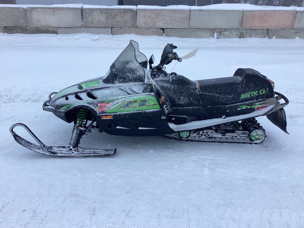 2000 Arctic Cat ZL 600 snowmobile, started, shows 9,419 miles, bill of sale.