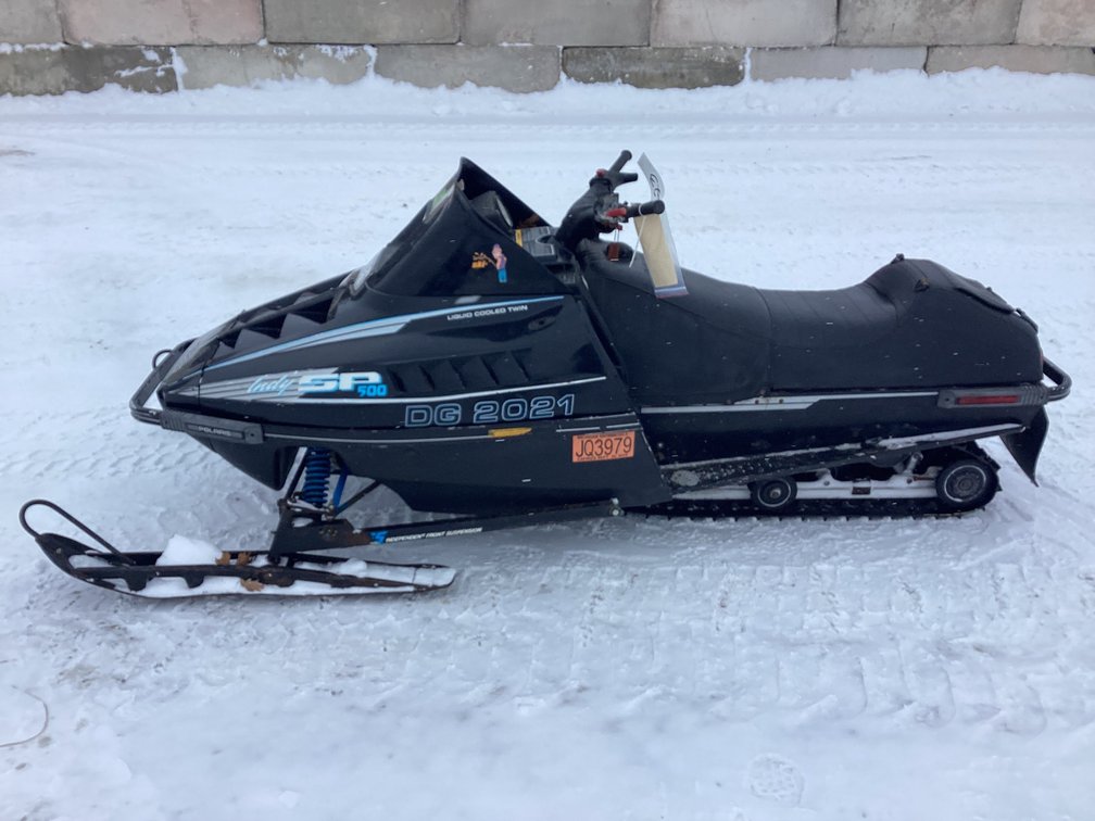 1991 Polaris Indy 500 SP snowmobile, started, shows 9,985 miles, bill of sale.