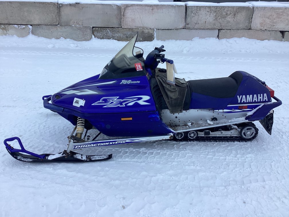 2001 Yamaha SXR 700 snowmobile, started, shows 3,717 miles, registration.
