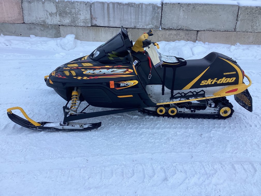 2002 Ski Doo MXZ 550F snowmobile, started, shows 7,486 miles, registration.