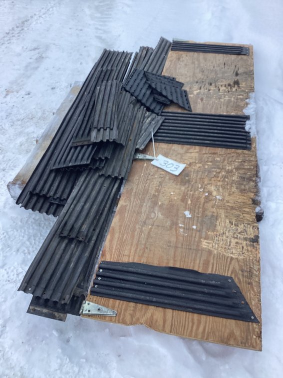 Skid of trailer ski guide material and edge ramp.
