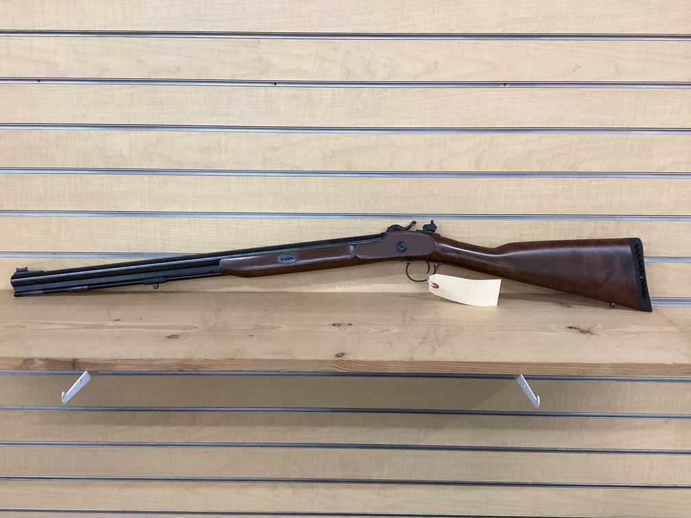 Thompson Center .50 caliber muzzle loader w/ case.