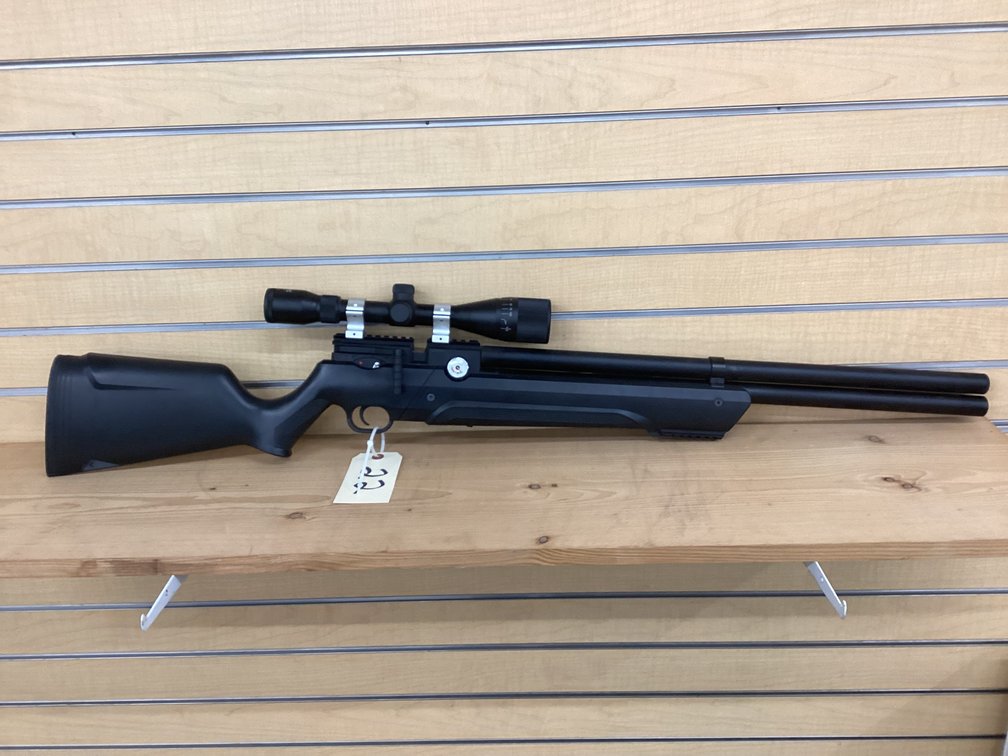 Avenger .22 caliber air pellet rifle w/ scope and air pump.