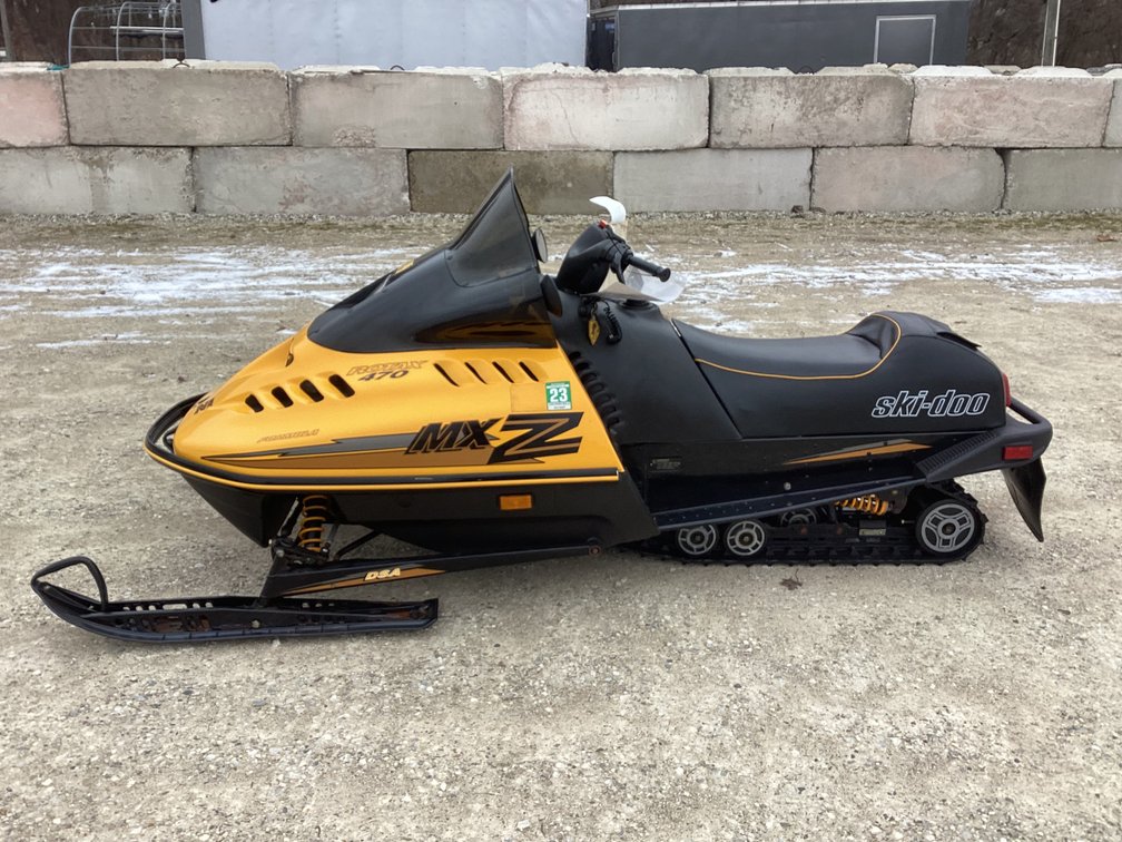 1993 Ski Doo 470 MXZ snowmobile, started, shows 8,357 miles, registration.
