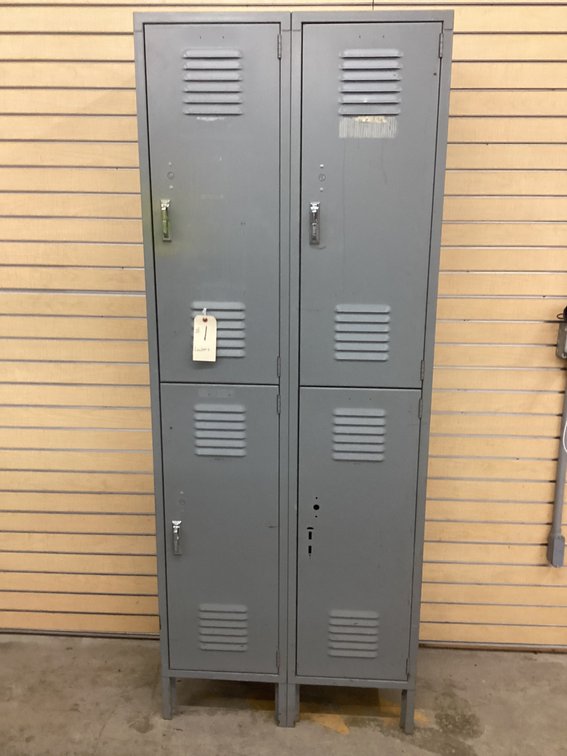 (1) Bank of four metal lockers.
