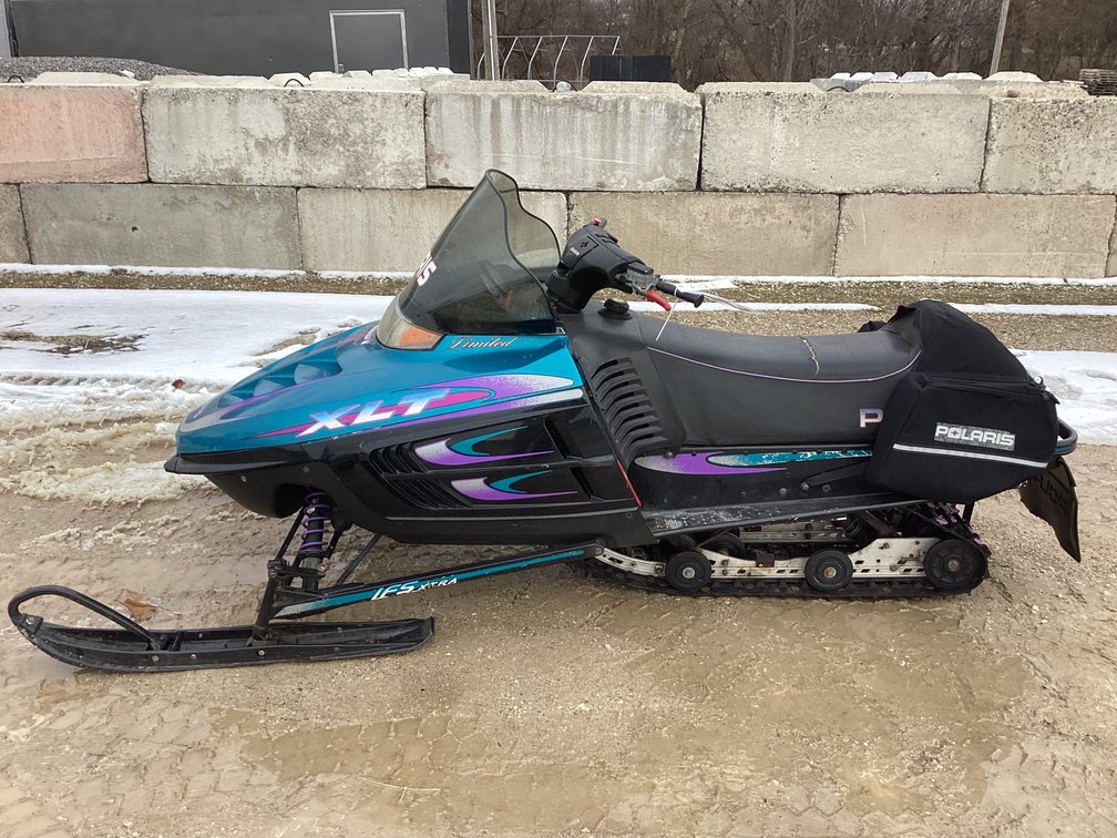 1997 Polaris XLT 588 snowmobile, started, shows 5,748 miles, bill of sale.
