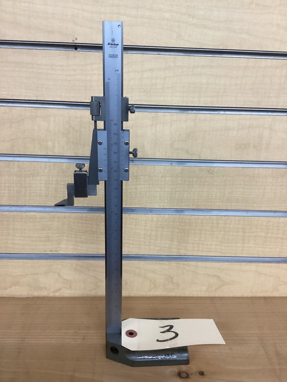 Mitutoyo 12” height gauge.