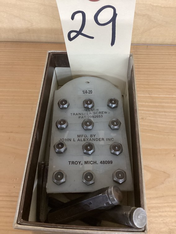 Box of assorted transfer screws.